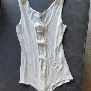 Emma & Sam LF ladder cutout white/cream body suit. NWT. Size L. Cotton.